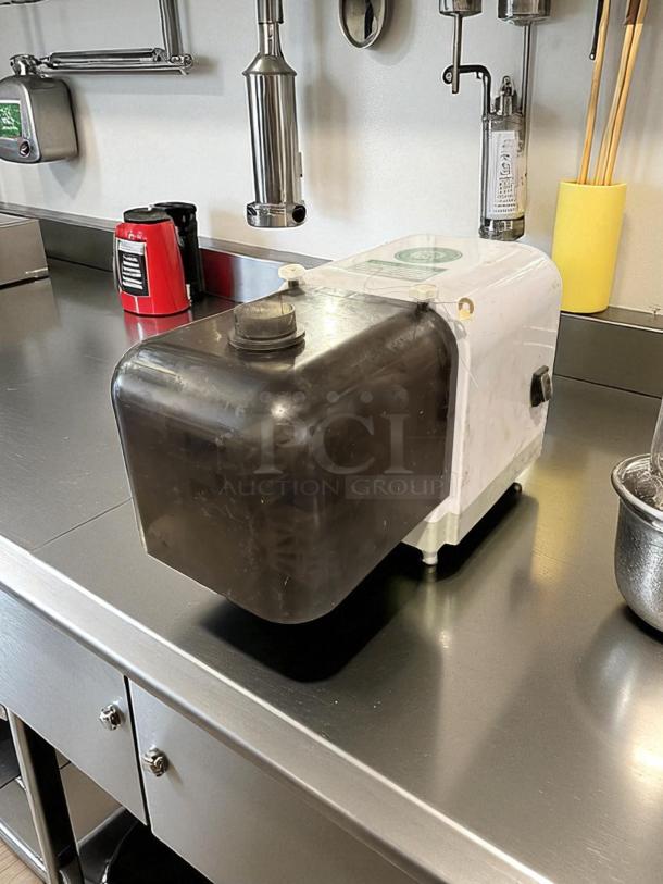 CXCGO XC-188A electric green onions cutter, tested and working, on stainless steel counter.