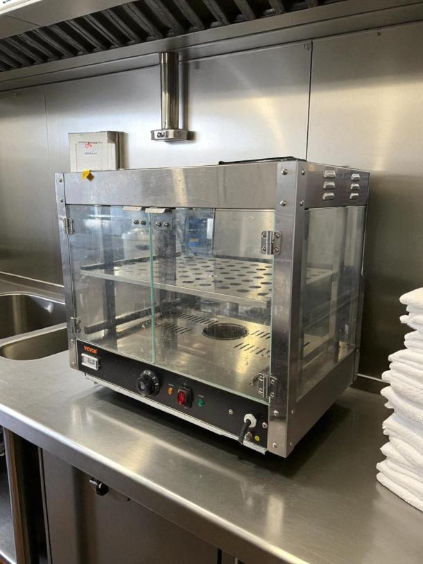 Vevor 2-Tier Commercial Food Warmer, model BWG-S, with water tray. Clear glass sides, metal body, new condition, tested and working.