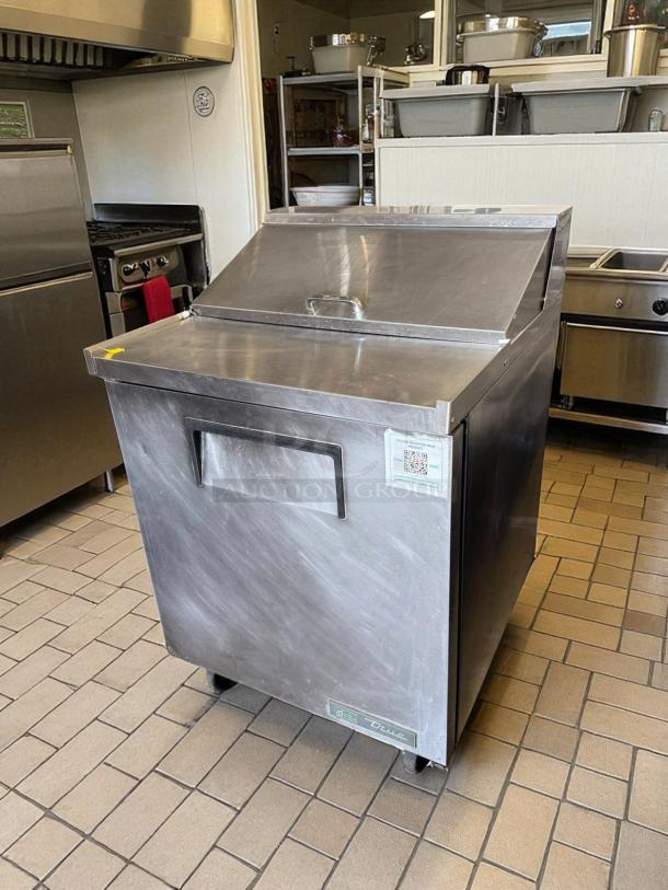 True TSSU-27-08 stainless steel refrigerated prep table, 1 solid door, 27" wide, excellent condition, tested and working.