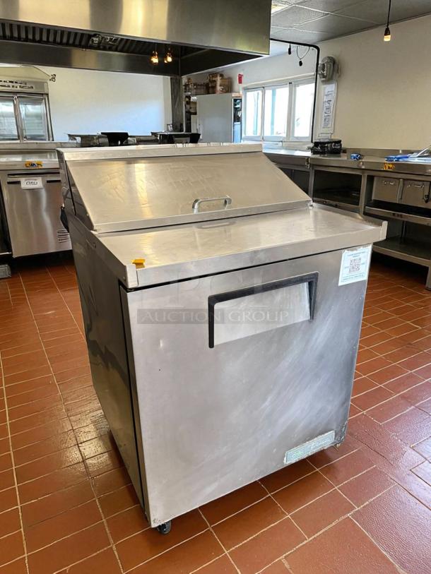 True TSSU-27-08 stainless steel sandwich prep table, excellent condition, 27" wide, tested and working.