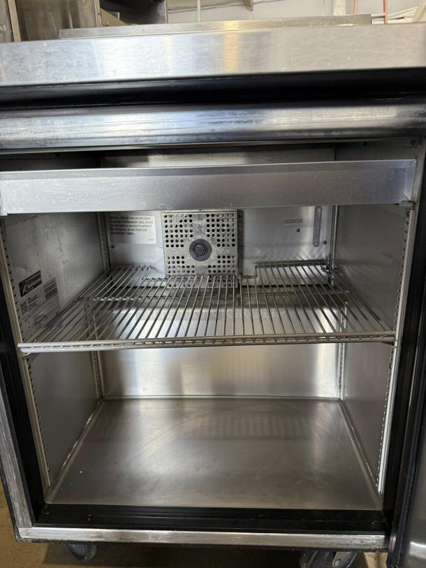 True TSSU-27-08 refrigerated prep table, stainless steel, 27" wide. One door, excellent condition, tested and working.