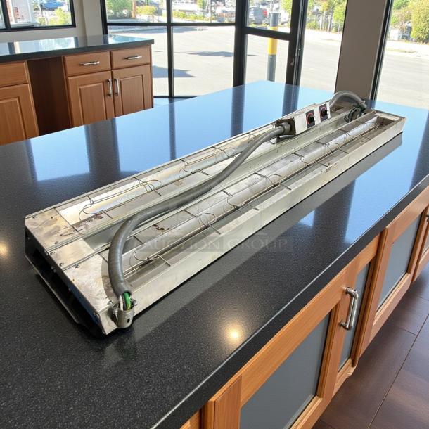 Hatco GRAH-60D 60" Dual Infrared Warmer in excellent condition on countertop, with toggle controls and 6" spacer, 120V, 2,800W.