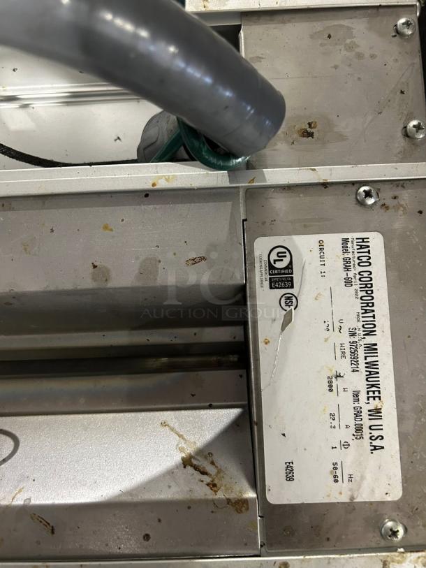 Hatco GRAH-60D Glo-Ray 60" infrared warmer, excellent condition, dual high wattage, 6" spacer, toggle controls, model tag visible.