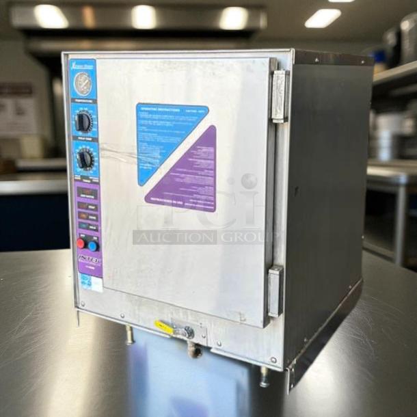 Groen XS-208-8-3 Intek stainless steel tabletop steamer, 208V, 3-phase, 8 kW, fully tested, labels showing operating instructions.