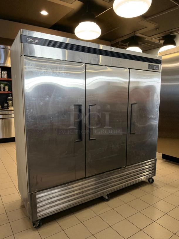 Turbo Air TSR-72SD-N refrigerator, 81 7/8", three-section, solid doors, stainless steel, excellent condition, tested and working.