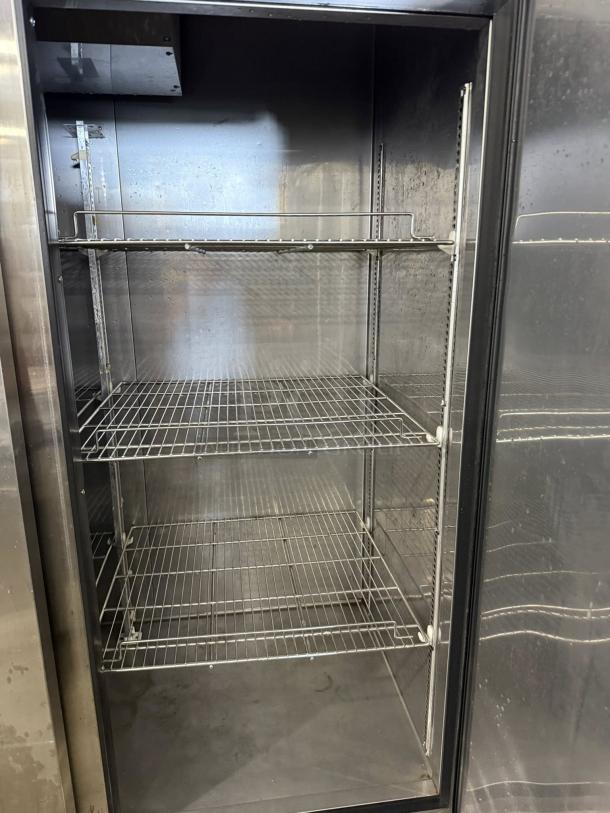Turbo Air TSR-72SD-N reach-in refrigerator, 81 7/8", three-section, solid doors, great condition, tested and working.