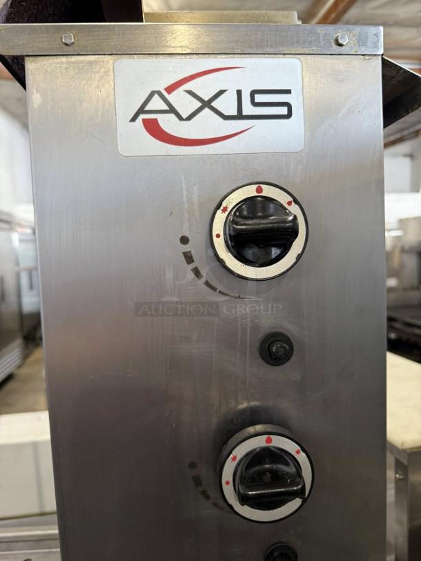 Axis AX-VB3 Vertical Broiler, natural gas, excellent condition, three individually controlled infrared burners, labeled control knobs visible.