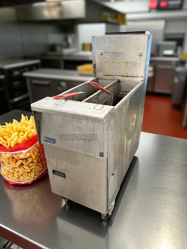 Pitco SG14TS Natural Gas Split Pot Floor Fryer, 20-25 lb capacity, 100,000 BTU, tested and working, stainless steel, used.