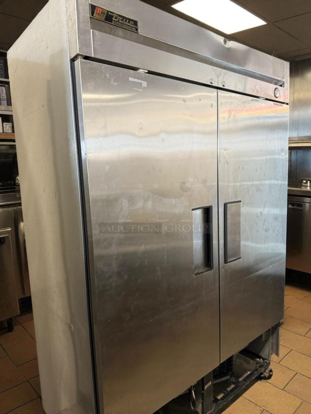 True T-49-HC 54" refrigerator, dual solid doors, tested, 115v. Great condition, left/right hinge, silver finish.