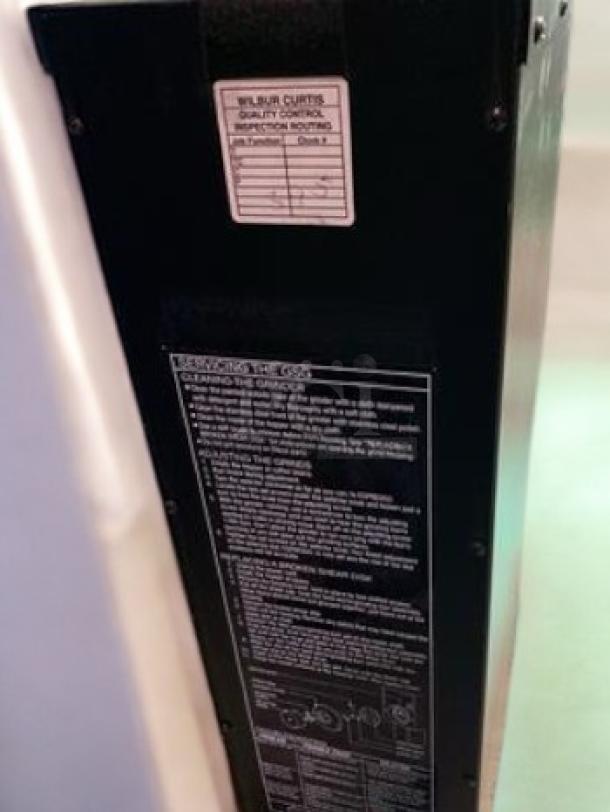 Wilbur Curtis GSG-3BLK coffee grinder, excellent condition, 120V, fully tested. Features visible quality control label.