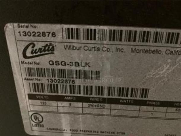 Wilbur Curtis GSG-3BLK Gourmet Coffee Grinder label, showing model, serial number 13022876, 120V, and UL listing.