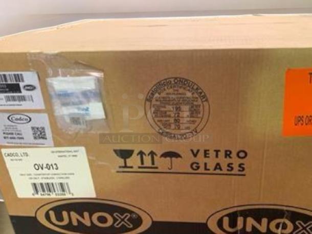 Brand new Cadco OV-013 countertop convection oven packaging, showing the model number and manufacturer labels.