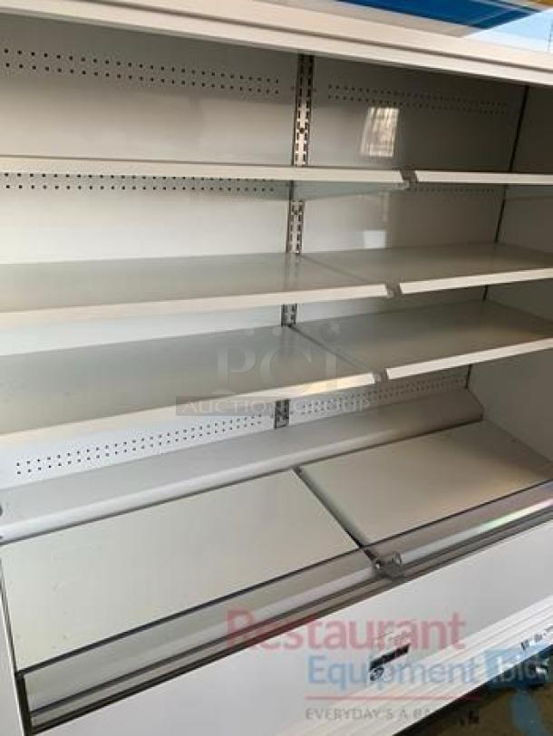 True TAC-72 open-air merchandiser, 72", excellent condition, shelves intact, 208-230V, tested and fully working.