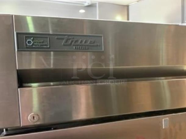 Like-new True T-23-HC single door reach-in refrigerator, stainless steel, 115V, fully tested, True Manufacturing label.