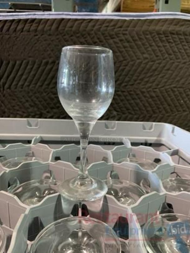 Lot of commercial glass racks with assorted glassware, including stemware and tumblers. Fully tested, ready to use. Great condition.