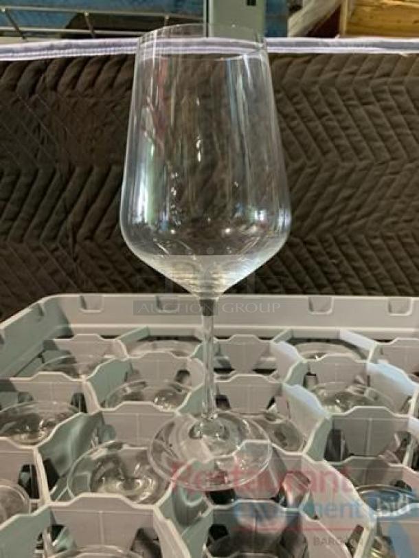 Lot of commercial glass racks with assorted glassware, featuring stemware and tumblers. Brands include Cambro and Carlisle style.