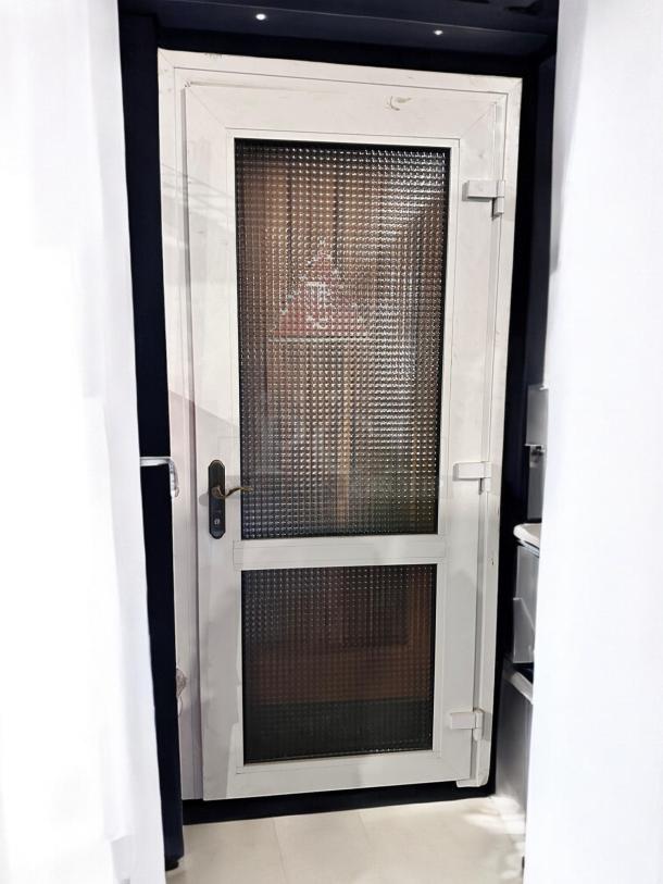 Commercial walk-in cooler door, 36" x 84", insulated, heavy-duty, standard swing, white frame, outstanding condition.