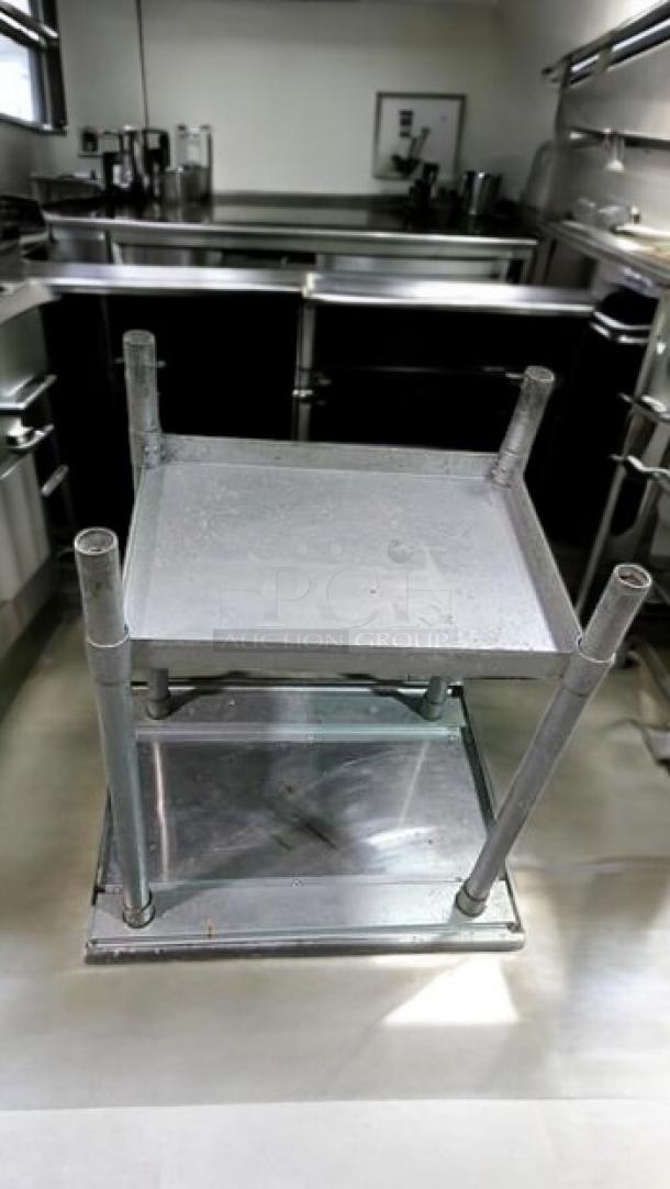 Advance Tabco T9-3-54 stainless steel work table, 24x30 inches, with undershelf, heavy-duty, outstanding condition.