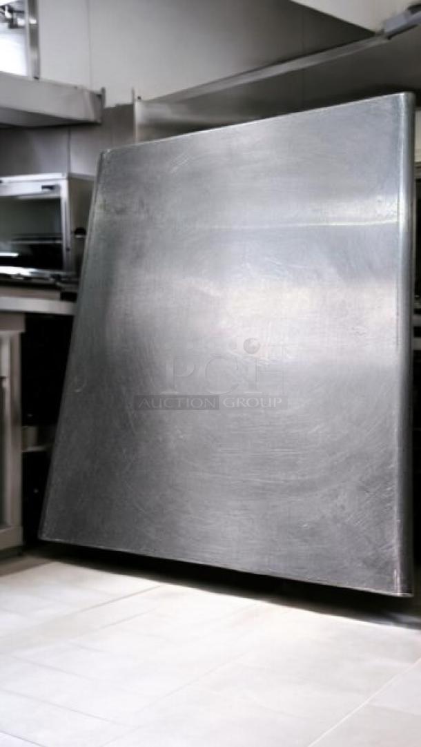 Advance Tabco 24x30 stainless steel work table, model T9-3-54, in outstanding condition with undershelf and heavy-duty design.