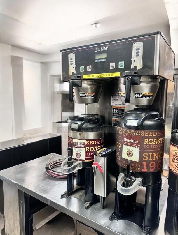 Bunn Dual Coffee Brewer with Airpots, in excellent condition, 120/240V, fully tested and operational, features visible brand markings.