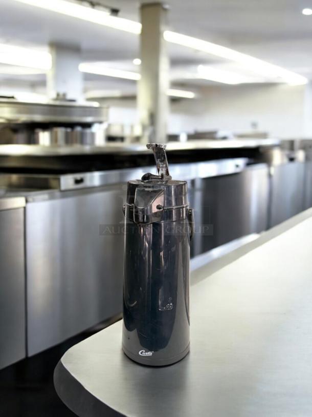 Black plastic airpot coffee dispenser, 2.5L, excellent condition. Fully tested and working. Generic Commercial model.