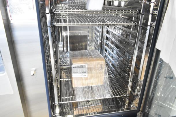 BRAND NEW Alto Shaam CTC10-20E stainless steel combi convection oven with racks. Features scratch and dent condition.