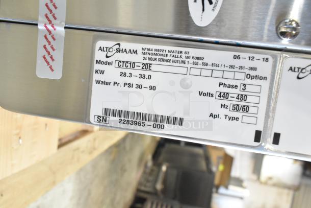 Brand new Alto Shaam CTC10-20E stainless steel combi convection oven, electric, 440-480V, 3-phase. Model label shown.