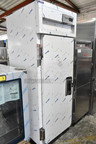 BRAND NEW SCRATCH AND DENT Delfield SAH1-S3-207 heated cabinet, stainless steel, 240V, single door, protective wrap visible.
