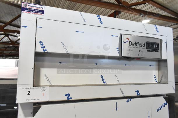 Brand new 2016 Delfield SAH1-S3-207 stainless steel heated cabinet, 240V, single door, with minor scratches and dents.