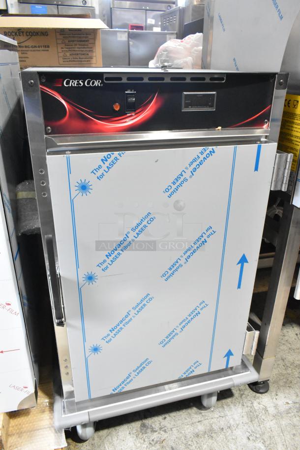 BRAND NEW CresCor H138NPS1816CLA stainless steel heated holding cabinet. Scratch and dent. On casters, 120V, 1 phase.