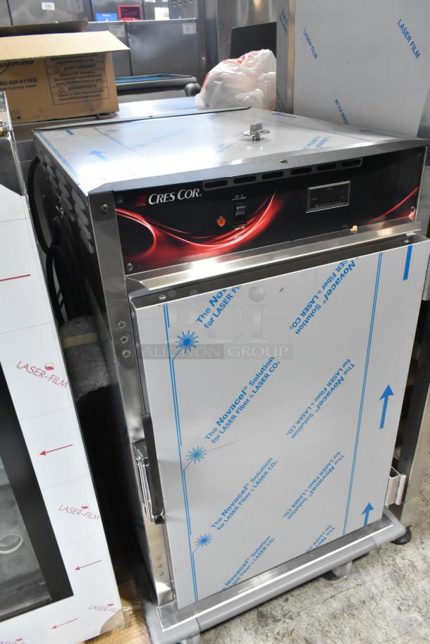 BRAND NEW CresCor H138NPS1816CLA stainless steel heated holding cabinet, 120V, 1-phase, on commercial casters.