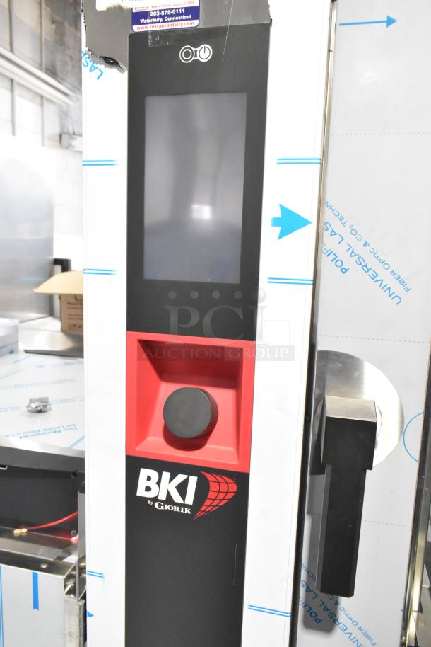BKI AETE101DF stainless steel combi convection oven, new with minor scratches. 208V, 3-phase, commercial use.
