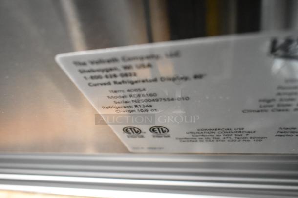 Vollrath RDE8160 60" refrigerated display label, model and serial info visible, R134a refrigerant, ETL certified.