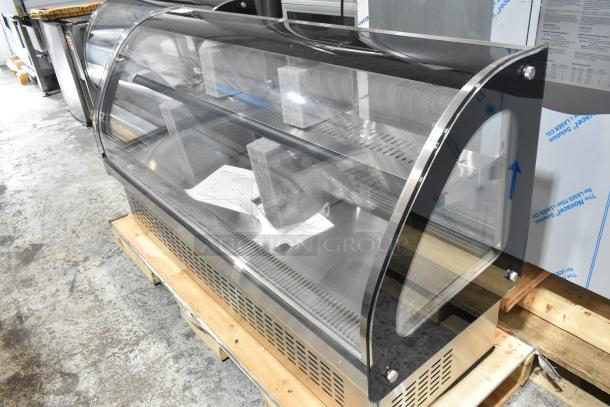 Brand new Vollrath RDE7160 60" curved glass refrigerated display cabinet, 120V, 1 Phase. Scratch and dent condition.