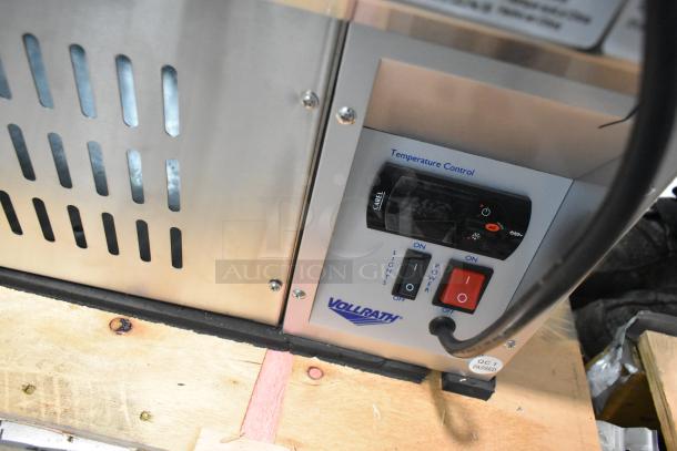 Vollrath RDE7160 control panel with temperature settings, power switch, and logo on a scratch and dent refrigerated display.