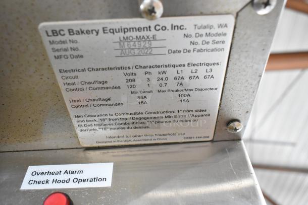 2022 LBC LMO-MAX-E Stainless Steel Commercial Rotating Rack Oven label showing electrical specs and installation info.