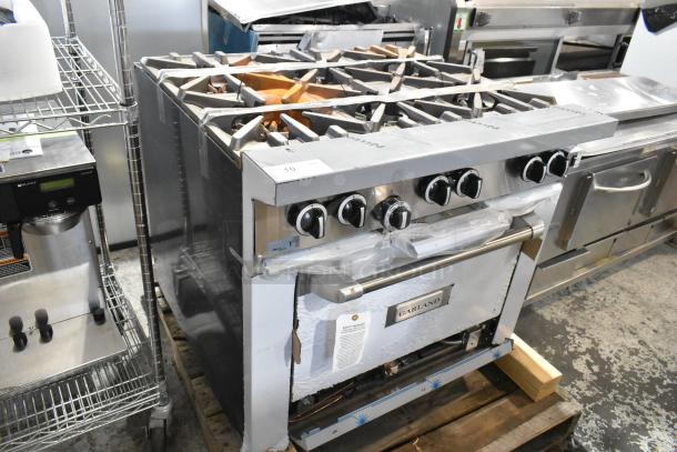BRAND NEW SCRATCH AND DENT Garland 372G366CN stainless steel 6-burner range with convection oven, over shelf, back splash, 236,000 BTU.