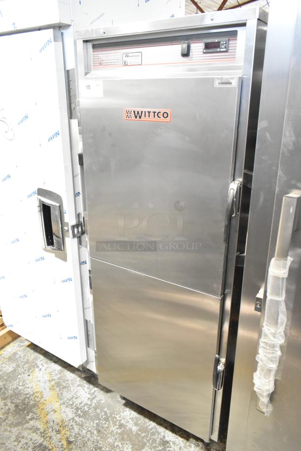 Winco 1826-15-DD-GD-PT-IS stainless steel heated holding cabinet with 2 half doors, commercial casters, 120V, 1 phase.