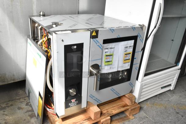 Brand new Bakers Pride AEHE061R combi convection oven. Stainless steel, electric, 208V, 3 phase, minor scratches.