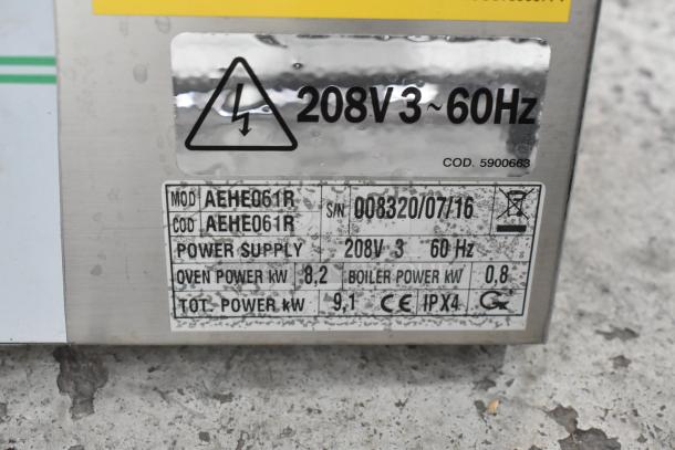 Bakers Pride AEHE061R stainless steel combi convection oven label showing power supply, model, and serial number details.