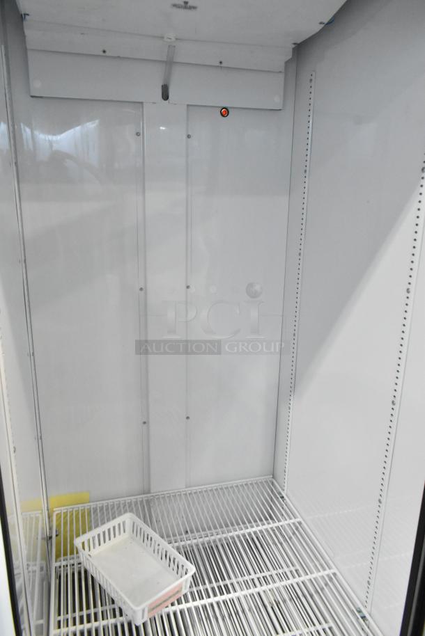 2021 True TSCI-600R-G-PH metal single door cooler with poly-coated racks. Excellent condition, 115V, 1 phase.