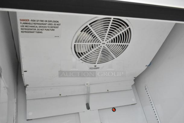 2021 True TSCI-600R-G-PH cooler interior, showing fan. Warning label about flammable refrigerants is visible.