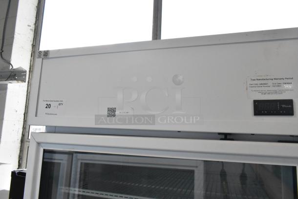 2021 True TSCI-600R-G-PH single door cooler merchandiser, poly coated racks, digital display, 115V, 1 phase, warranty details visible.