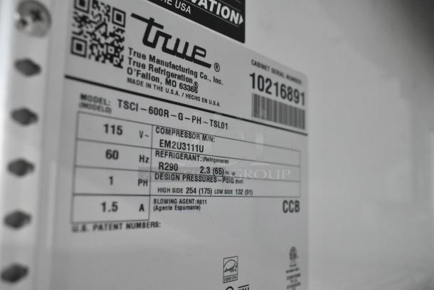 Label of 2021 True TSCI-600R-G-PH single door cooler with model and energy specs, including refrigerant and voltage.