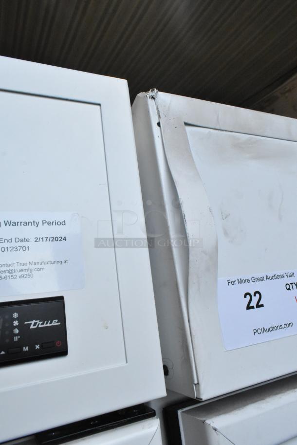 2020 True TSCI-600R-G-PH reach-in cooler with damaged corner, warranty to 2024. Includes poly-coated racks. 115V, 1 phase.