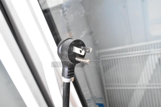 2020 True TSCI-600R-G-PH single door cooler plug view, includes poly coated racks, 115V, 1 phase.