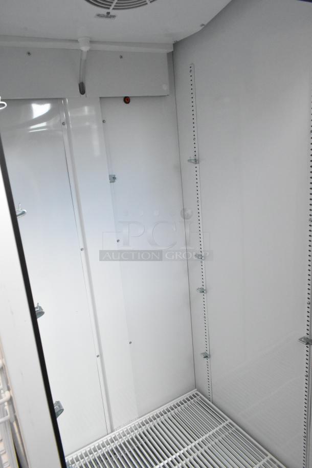 2021 True TSCI-600R-G-PH commercial cooler, single door, metal interior, poly coated racks, 115V, 1 phase.