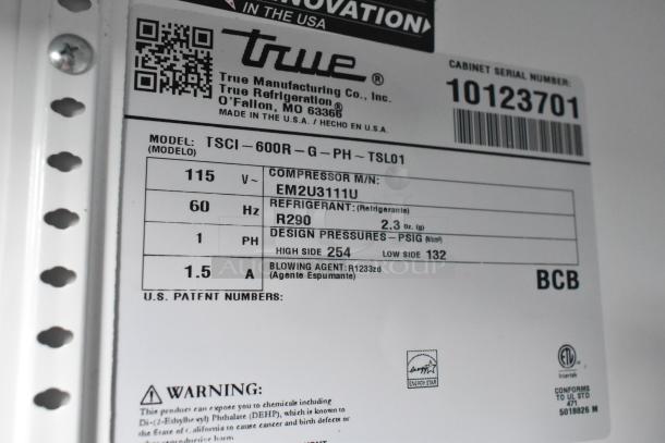 Label of 2021 True TSCI-600R-G-PH commercial cooler. Shows model info, voltage, refrigerant type, and energy certification.
