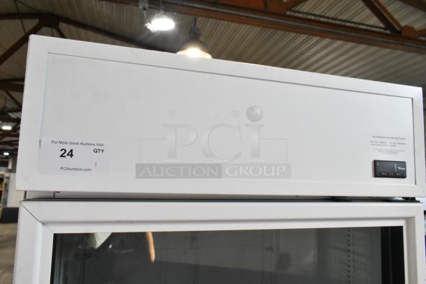 2021 True TSCI-600R-G-PH metal reach-in cooler, single glass door, poly-coated racks, 115V, 1 phase, label reads "24 QTY."