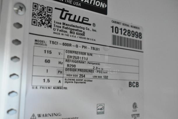 Label of True TSCI-600R-G-PH commercial cooler with specs: 115V, 1PH, uses refrigerant R290. Model, serial number visible.